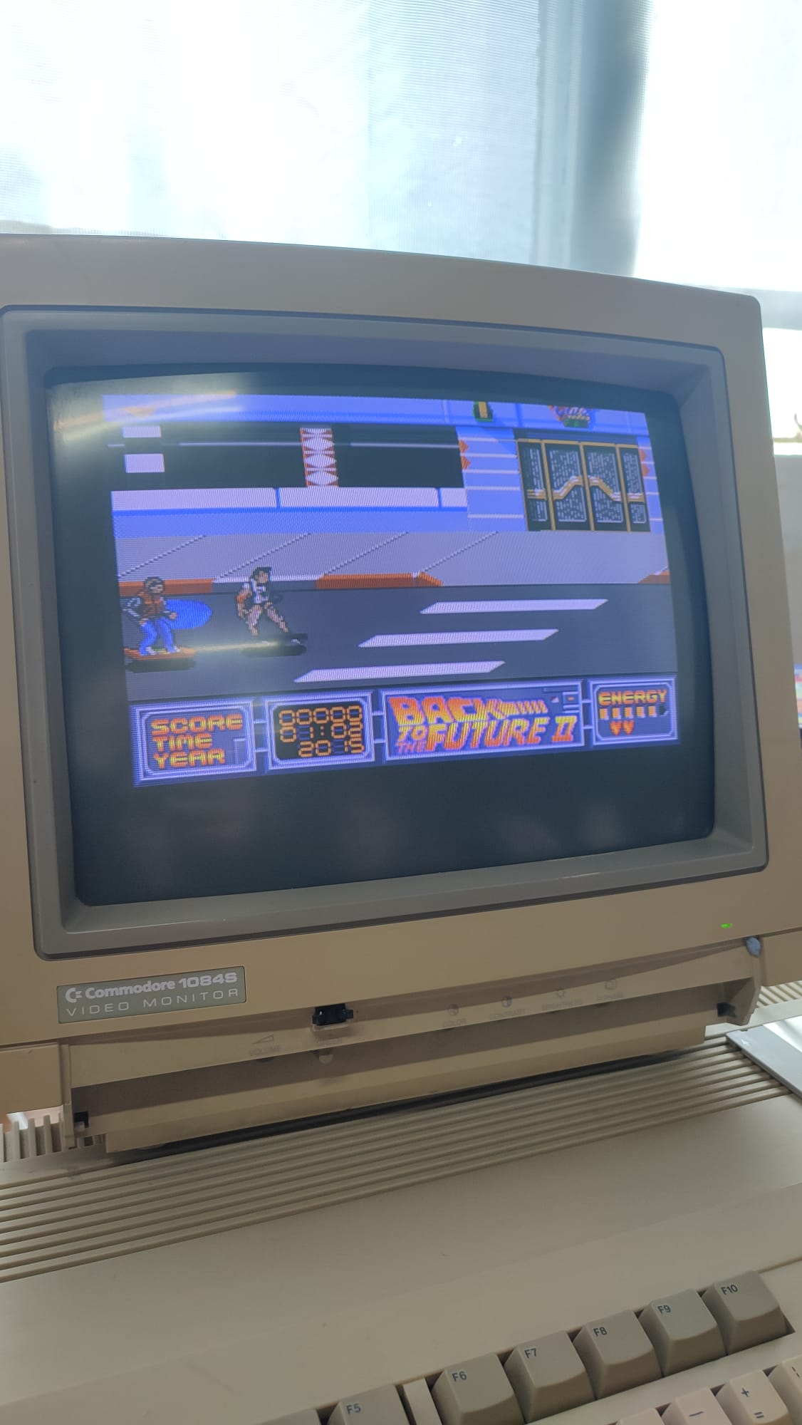 A CRT monitor with Back To The Future 2 on the screen